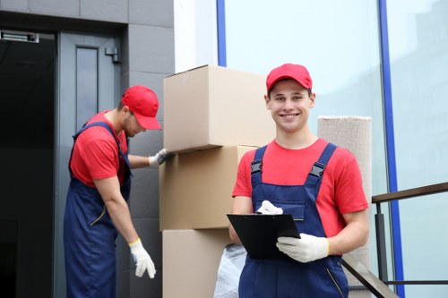 Moving team preparing belongings safely during a Twickenham van service