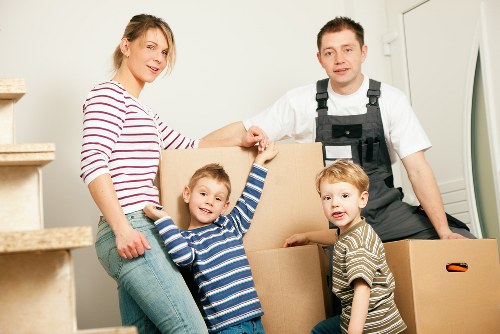 Moving staff using safe lifting techniques during a van removal service