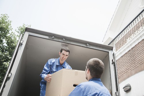 Man and van team reviewing safety procedures and equipment checks